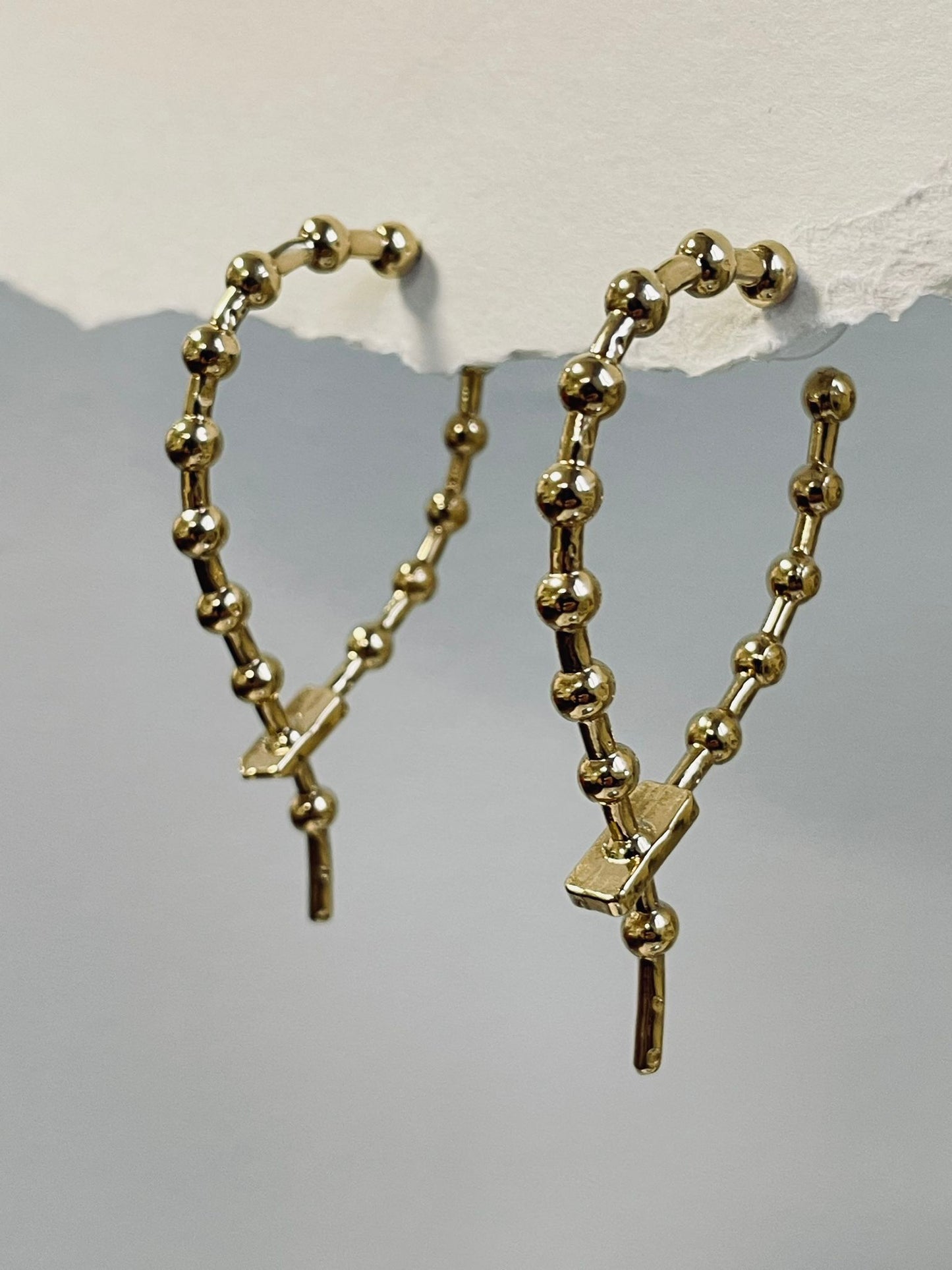 Flange earrings